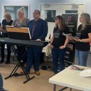 The Amesbury Community Soul Singers, pictured here at an event for Amesbury Town Council, will be joining the Big Sing CHoir at Winton Community Academy for a concert on Saturday, May 11.
