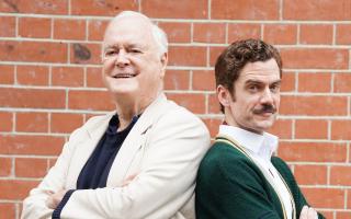 John Cleese with Adam Jackson-Smith as Basil Fawlty pose before the opening of Fawlty Towers The Play (Ian West/PA)