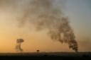 Smoke rises following an Israeli bombardment in the Gaza Strip where seven Israeli soldiers were killed in an ambush (AP Photo/Ohad Zwigenberg)