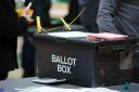 A ballot box arrives as polls close and counting begins at Rochdale Leisure Centre (Peter Byrne/PA)