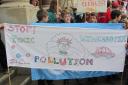 Green campaigners march through Winchester to protest against air pollution