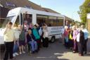 Delight: Members of the Jubilee afternoon club and the evening club of Andover Phab with their minibus which has been blessed by Reverend Jill Bentall. Also present are past mayor Maria Neal and Ross Probert, regional development officer who travelled up 