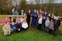 Official opening: Wild Meadow garden at Portway School. Pupils are pictured with school staff, Hampshire County Council grounds manager Steve Merriman