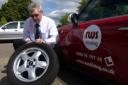 Driving instructor Robert Smith with his slashed tyre