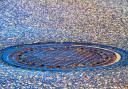 Stock image of a drain cover