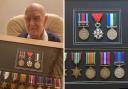 Veteran Rusty brought his medals along to show residents.