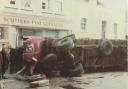 The scene at the bottom of the street with the lorry on its side