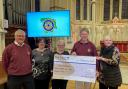 Members of the club and Cllr Andersen with the cheque