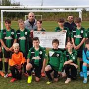 Andover New Street U13s received a cheque for over £600