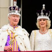 King Charles III and Queen Camilla on the balcony of Buckingham Palace (Picture: Leon Neal/PA Wire)