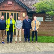 Cllr Chris Donnelly (TVBC), Ian Whitehorn (RV Dart & Son, builders), Dale Whitfield (Barclay & Phillips Architects), Simon Potter (Village Hall Committee) and  Cllr Nick Lodge (TVBC) in front of Picket Piece Village Hall