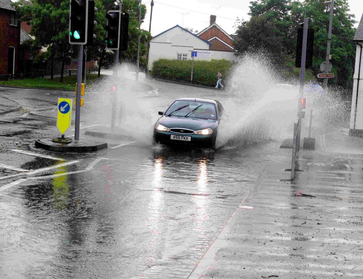 A car drives through flood water in Western Avenue, near London Street in 2008