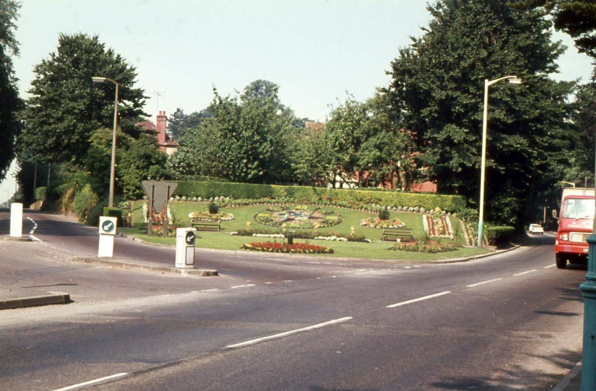 The Floral Clock, today the site of the Millennium Man. The Weyhill Road (the A303) had the priority on this junction over the Salisbury Road (A343), before there was a roundabout. From the Jeffery Saunders collection.