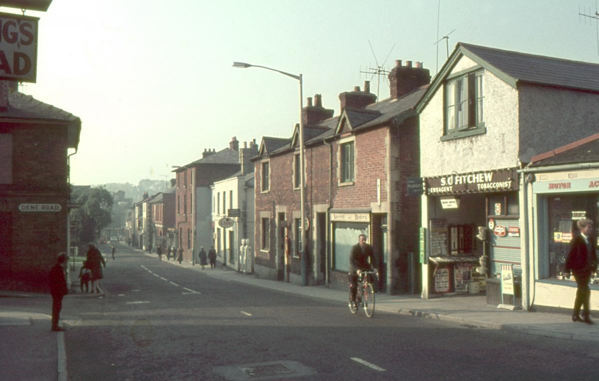London Street (A303) looking west towards the town. The Kings Head (today Co-op Funeralcare) and Dene Path to the left. Photo taken from the A3057 where today this inner ring road dissects the former London Street.

Picture from the Jeffrey Saunders col