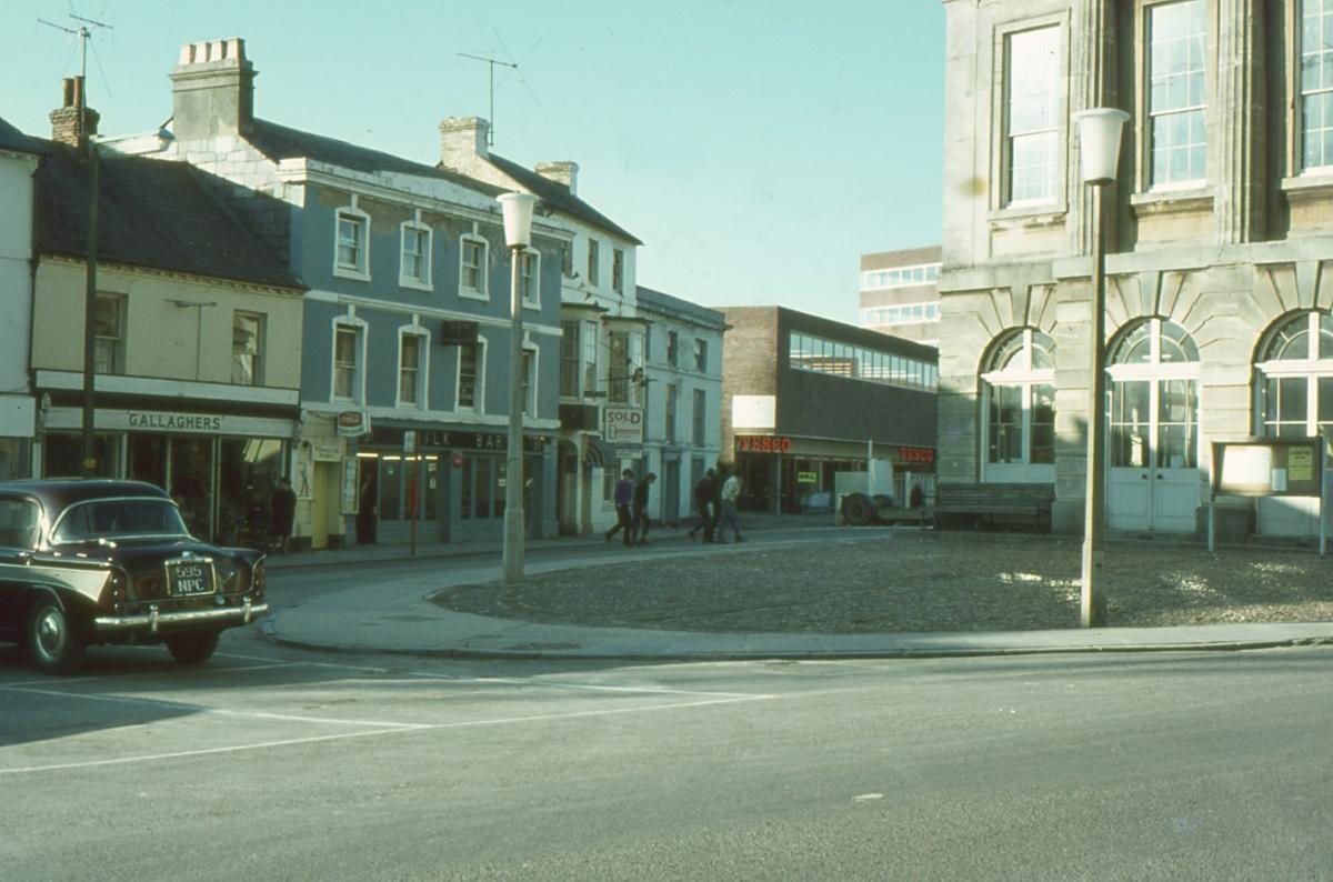 The newly constructed Chantry Centre (the revamped roofed in roofed version did not come till many years later).  The two storey Tesco Supermarket (Home and Wear upstairs) can be seen at the entrance.

Picture from the Jeffrey Saunders collection.