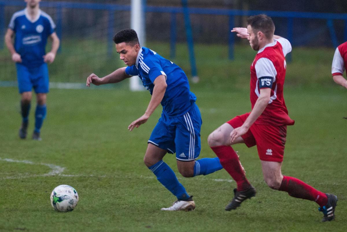Andover Town's Aaron Nesbeth wins a midfield ball in his side's 3-1 win over Fawley at The Portway Stadium - Picture Andy Brooks