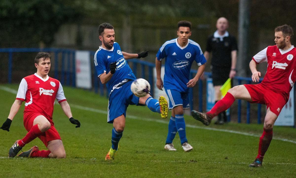 Andover Town's Javier Santafe-Vivo Clears the ball up field in his side's 3-1 win over Fawley at The Portway Stadium - Picture Andy Brooks