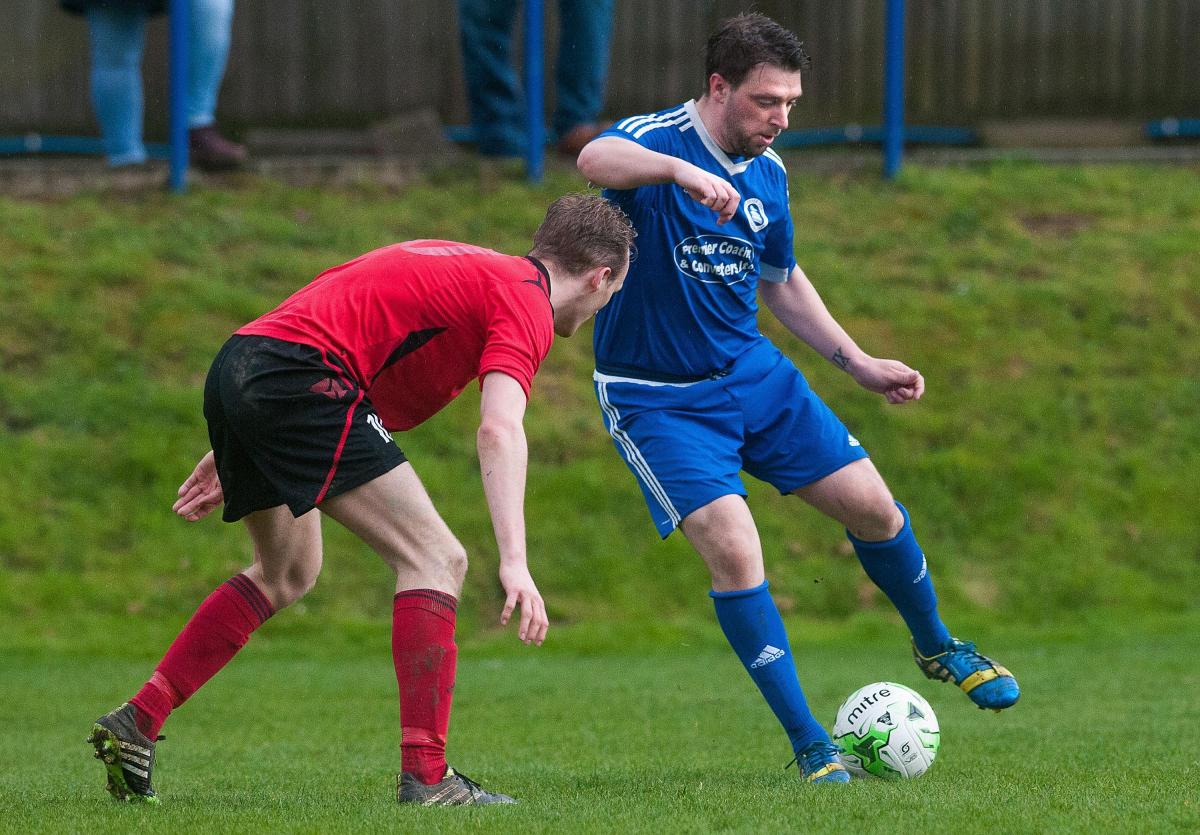 Andover Town's Zach Glasspool tries to find a way past the Lymington defence in Town's 3-0 defeat at The Portway. 1st April, 2017 - Picture Andy Brooks