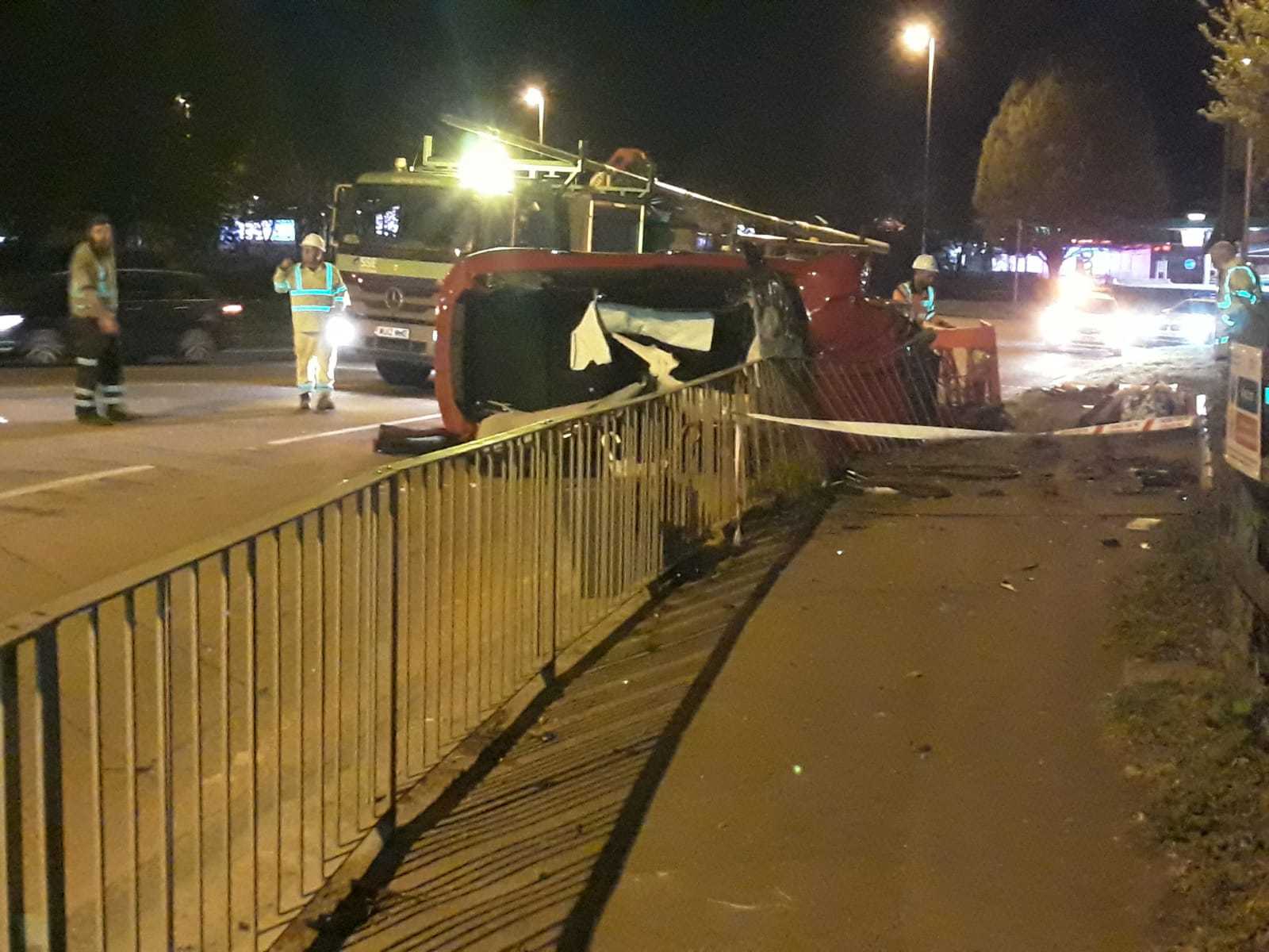 The red Mini Cooper collided with a lamppost