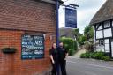 Shane Wells and Georgie Littler in front of Clatford Arms pub