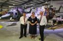 Army Flying Museum chief executive Lucy Johnson with staff from UK Power Networks Services