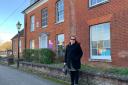 Frances Tree is sad to see the bleak future of Andover museum (in the background)