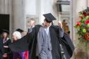 Martin celebrating after receiving his BA in Creative Writing at November's University of Winchester graduation ceremony