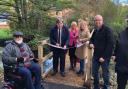 Kit Malthouse MP opens the bridge with members of the Whitchurch Conservation Group