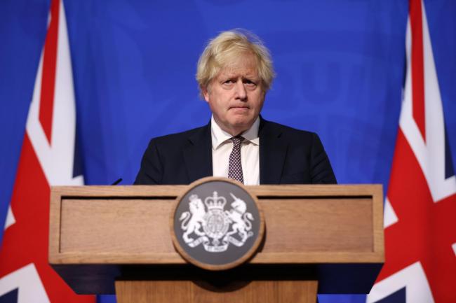 Prime Minister Boris Johnson announced measures to slow the spread of the new variant (Hollie Adams/PA)