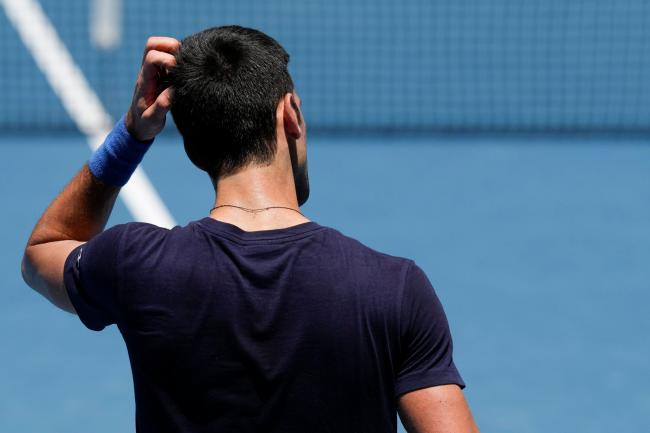 Defending men’s champion Serbia’s Novak Djokovic