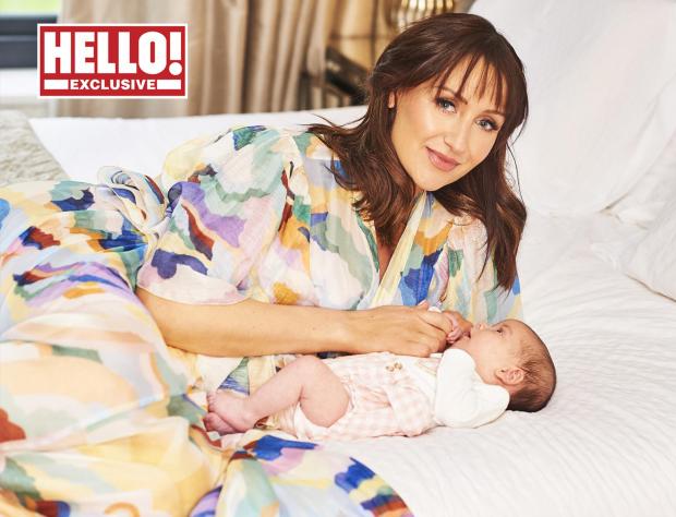 Andover Advertiser: Catherine Tyldesley with her baby daughter Iris as they appear in this week's edition of the magazine. Credit: Hello! Magazine/PA