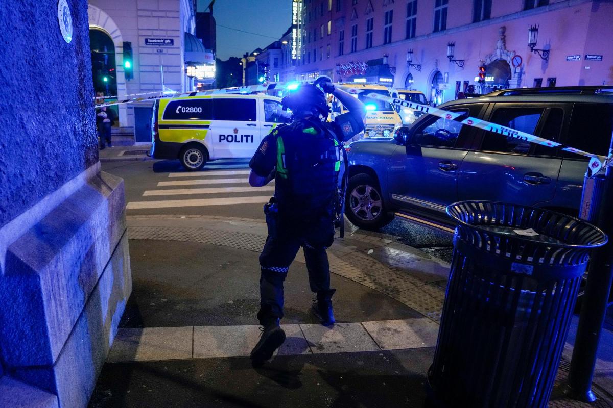 Police gather at the site of a shooting in Oslo (Javad Parsa/NTB via AP)