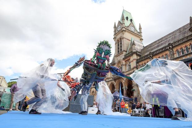 Winchester Hat Fair 2022. Eko a 13 foot tall Sea Giant puppet during the Autin Dance Theatre production Out of the Deep Blue.