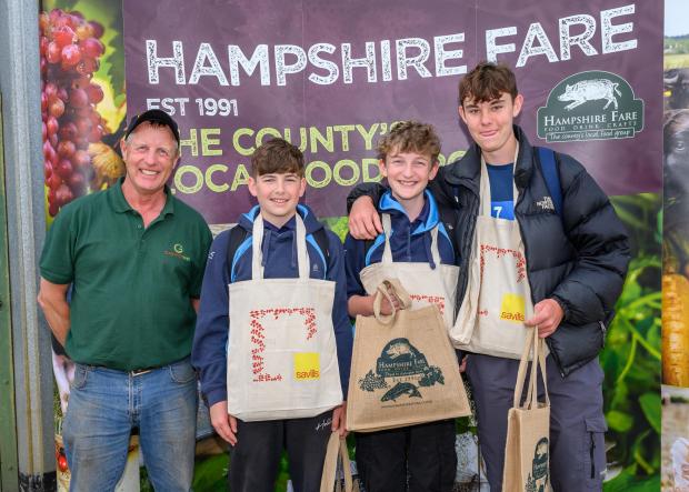 Andover Advertiser: Farm Manager David Miller of Wheatsheaf Farming with one of the winning teams - Farm my Food 2022, photo: The Electric Eye Photography