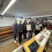 Whitchurch Silk Mill receive an award from VisitEngland.