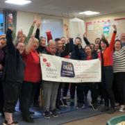 Staff at Poppies Daycare Nursery in Tidworth celebrating the 'outstanding' Ofsted rating
