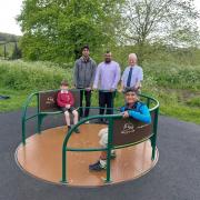 Standing from left, Aathi Ravi and Vinoth Kumar of Family Shopper and Hurstbourne Tarrant parish council chairman Ian Kitson. Sitting are HBT Primary School pupil Peter Clutterbuck and Vinoth's son Mahith.