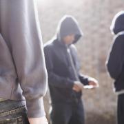 A staged photo of teens involved in anti social behaviour