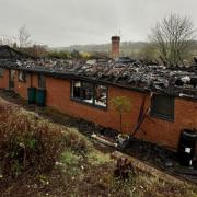 The roof of the bungalow was heavily damaged in the fire
