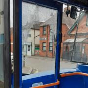 The shattered doors of the bus