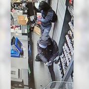 The two men were caught on a CCTV camera