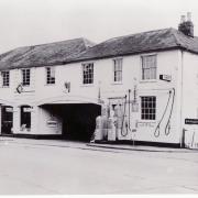 Henlys Garage, Bridge Street Andover in the early 1960s. Then a BMC dealership.  Today this is the site of the town centre Sainsburys.  NOP.