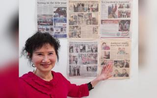 Sui Sui with copies of the Andover Advertiser