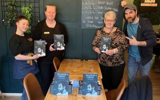 Andrew Horner (right) at the launch of his book at Coffee78 in Andover
